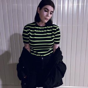 Black bodysuit with neon yellow stripes
